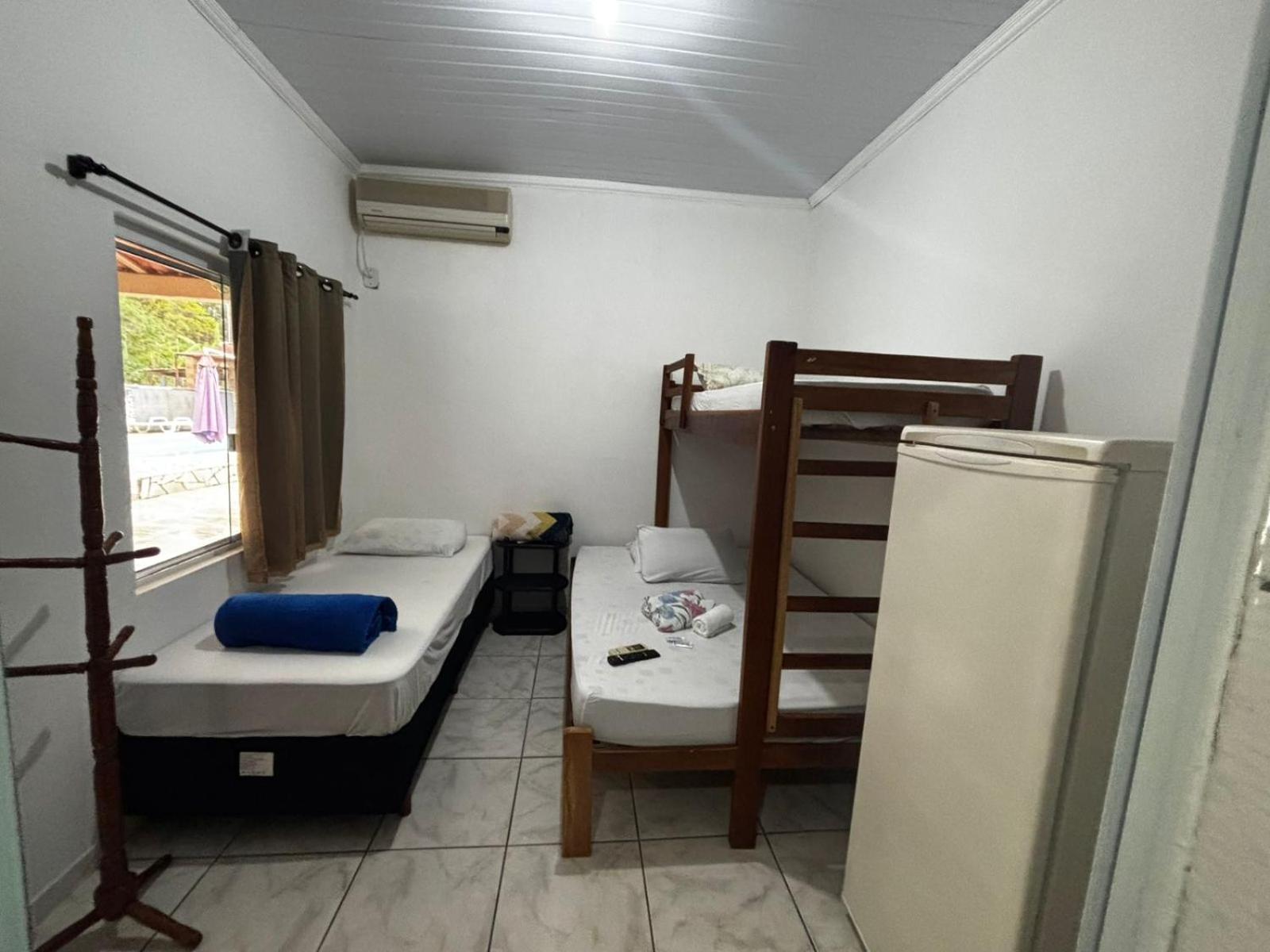 Quarto Quádruplo com Banheiro Privativo